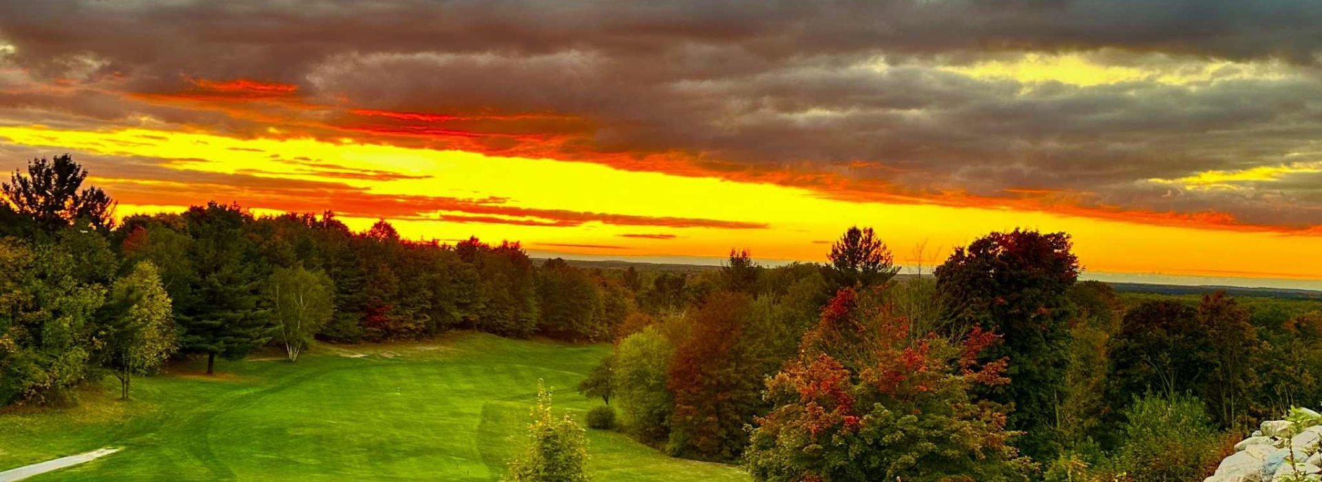 Fairway of golf course at sunset